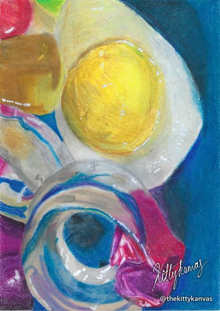 Coloured-pencil drawing of a fried-egg gummy sweet, a glass ring sweet and a pink wrapper on deep blue